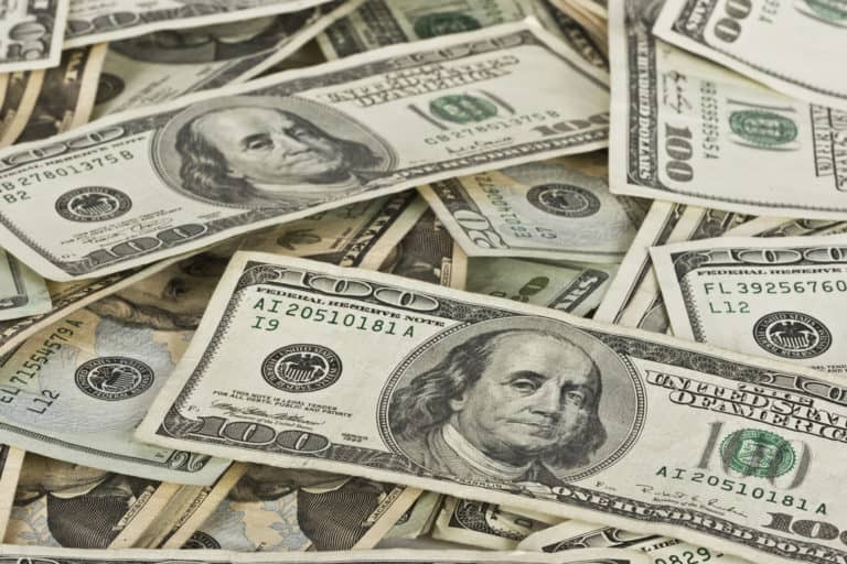 A large pile of $100 bills
