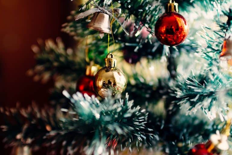A Christmas tree with multi-colored ornaments