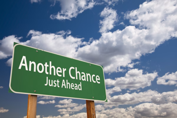 A road sign reads "another chance just ahead" in reference to DUI expungements in San Diego County
