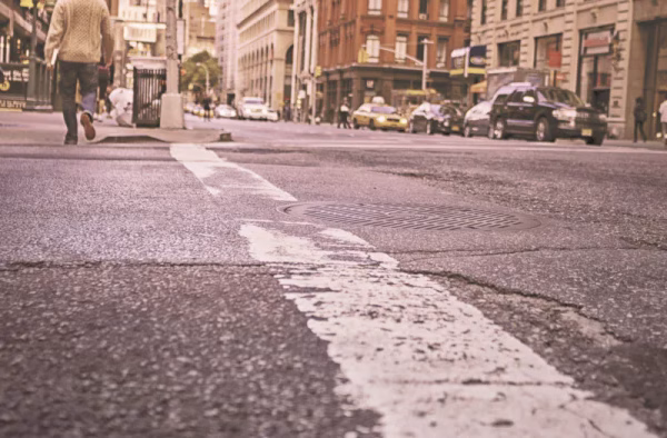 A man walks down an empty road symbolizing moving forward in life after a DUI conviction
