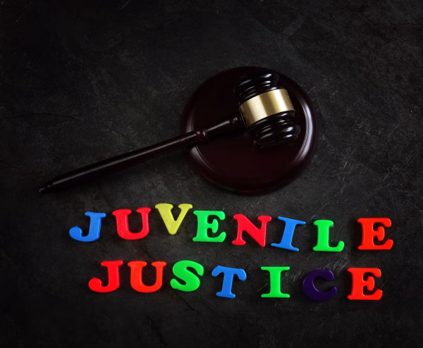 An image with children's alphabet letters spelling out "juvenile justice"